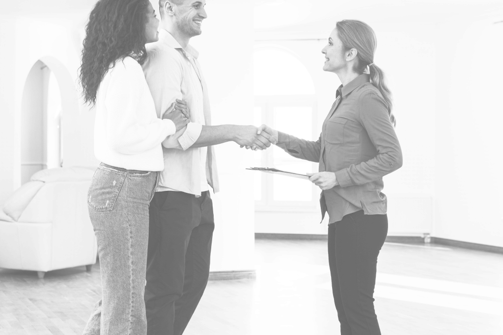 Encaixada de mans entre client i agent